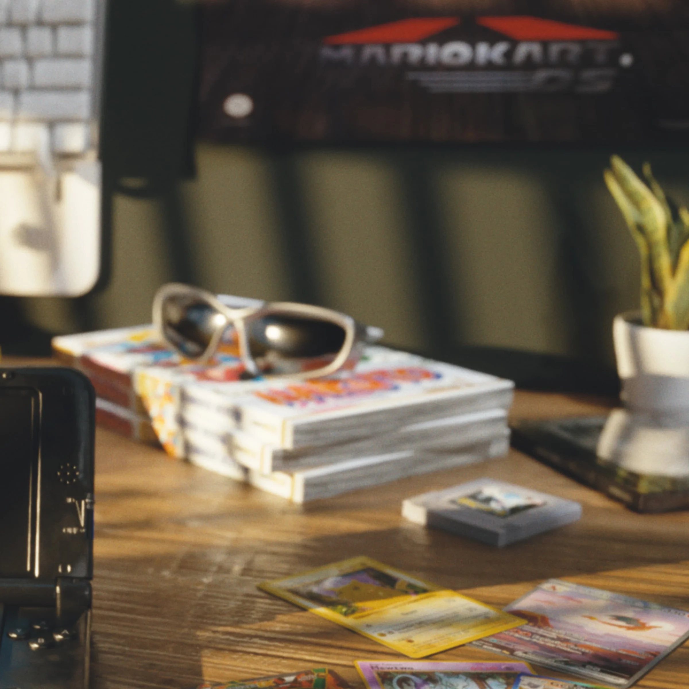 Glasses, magazines, and a handheld console arranged in warm light