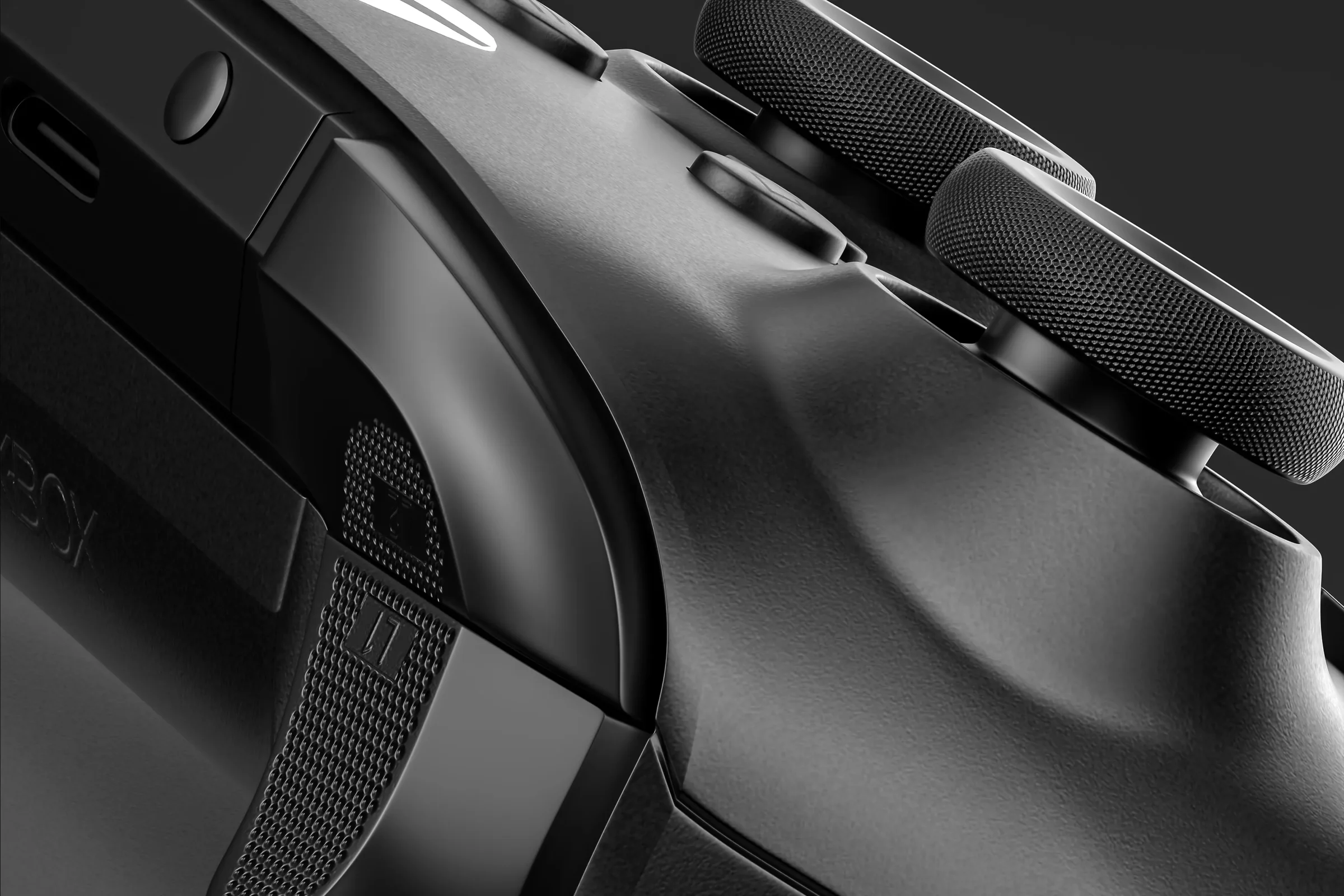 Macro view of the controller triggers and textured grips